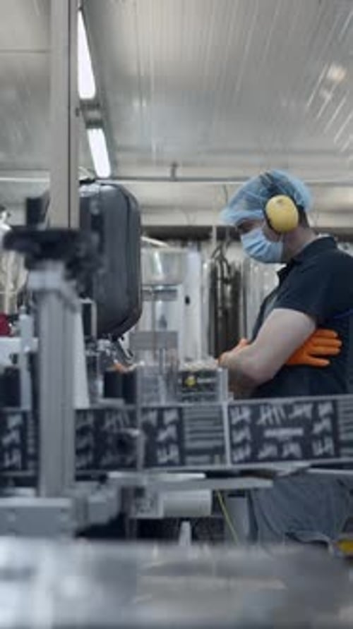 Quality Control Inspector In A Beer Factory Selective Focus