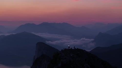 Aerial view of mountain peak with light, Austria.