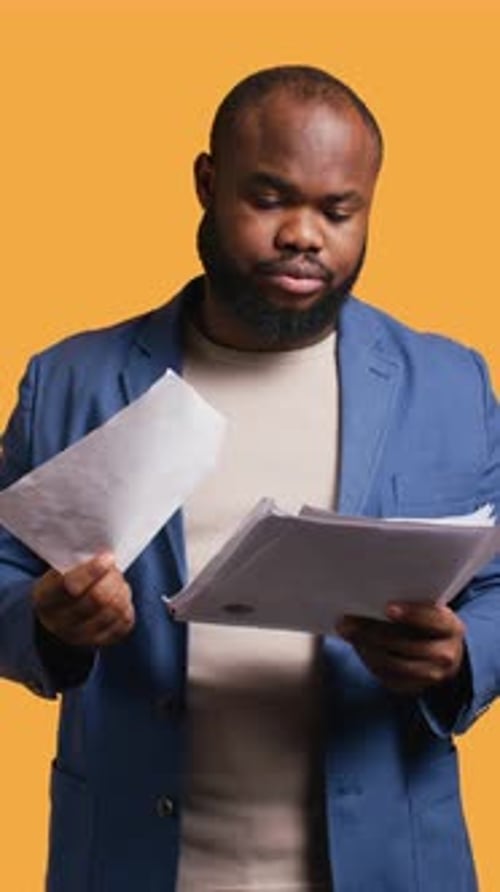 Vertical Video Accountant Does Profit Analysis for Company Feeling Perplexed By Confusing Data