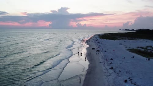 Beautiful Florida sunset in Sarasota. Aerial shot of coastline, horizon. 60 fps