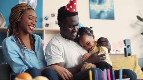 Happy Family Celebrating Birthday at Home