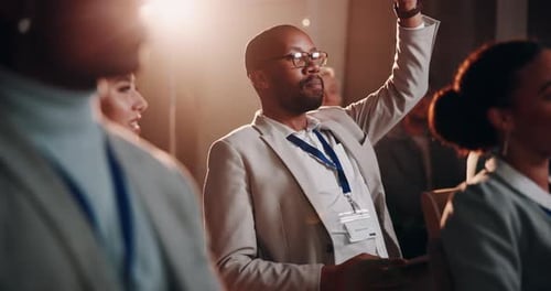 Man Asking a Question at a Corporate Conference