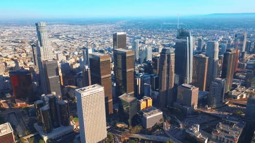 Gorgeous skyscrapers surrounded by busy traffic roads in Los Angeles, USA.