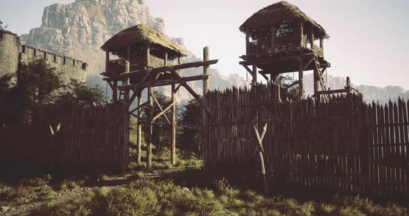 Majestic Wooden Towers Overlook a Rustic Fortified Entrance in Nature ...