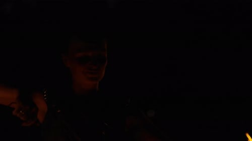 Woman Fire Dancer Performance at Night