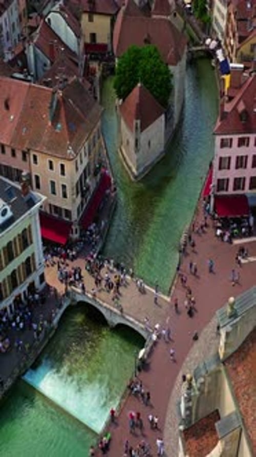 Old Town Center of Annecy and the River Thiou with Tourists Visiting An Emblematic River of Annecy