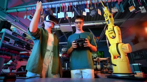 Woman Using VR Headset to Control Robotic Arm