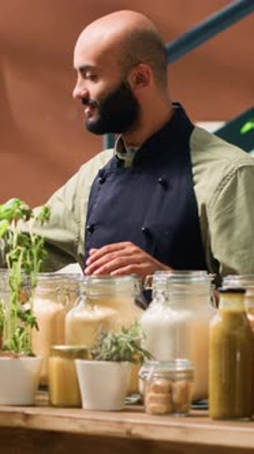 Adult Behind Counter with Food Ingredients