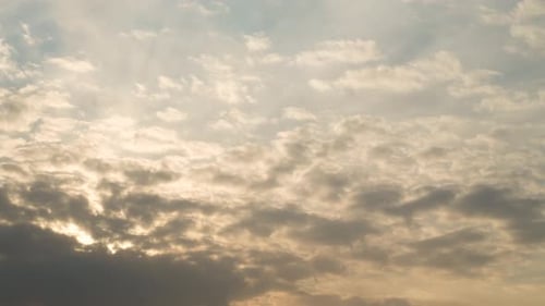Golden Sky with Clouds at Sunrise