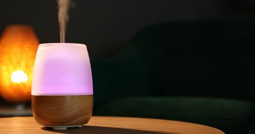 Aroma Diffuser Emitting Vapor with Changing Colors