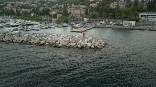 Scenic Drone View of a Vibrant Coastal Harbor and Marina