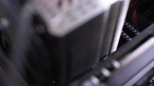 Closeup Highangle View of Unrecognizable Person Removing PC CPU Air Cooling System Assembly Radiator