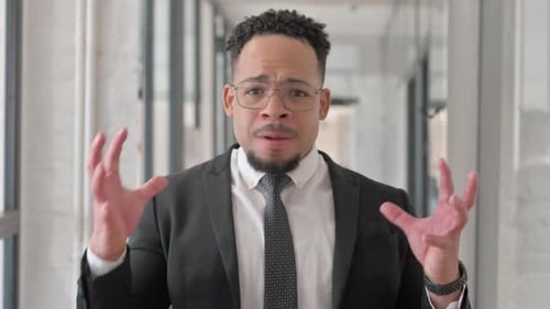 Furious Man Yelling Frustrated in Office Building