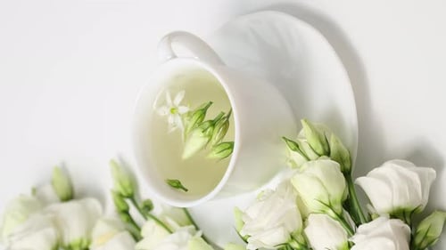 Elegant Tea Cup with White Roses Still Life
