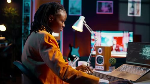 African American Girl Uses Artificial Intelligence Software for Machine Learning