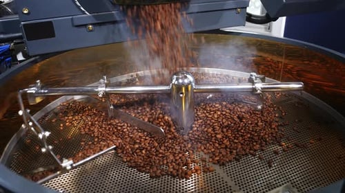 Coffee Beans Being Roasted in a Drum Machine