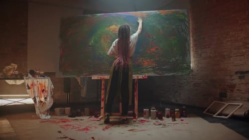 Craftswoman Paints with Fingers on Big Canvas in Workshop