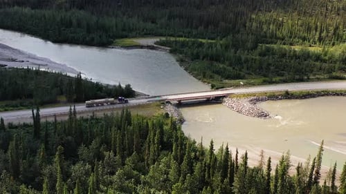 Tank truck driving on a highway in Alaska, Portage Glacier road. Oil and Gas Transportation and