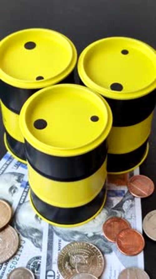 A barrel of oil against a backdrop of dollars as a concept for the oil crisis. A barrel of oil