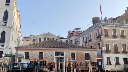 Traveling With Boat On The Grand Canal In Venice, Passing Hotels And Other Buildings