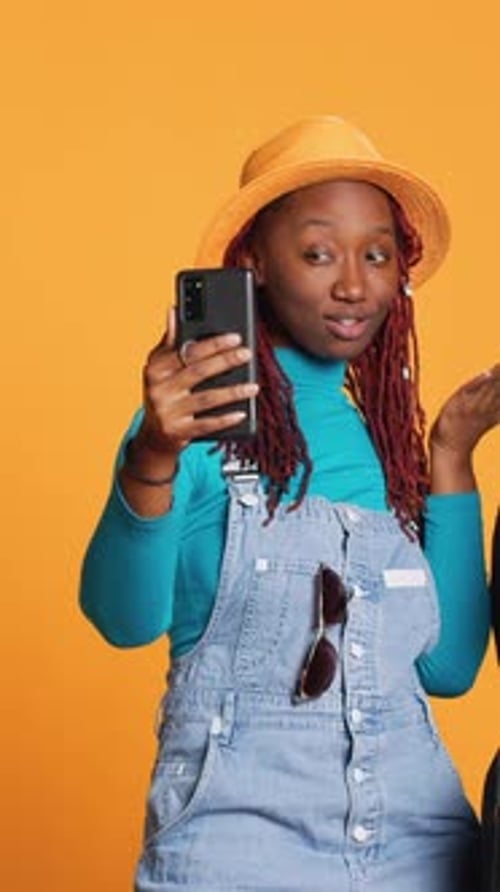 Vertical Video Female Model Taking Photos on Vacation