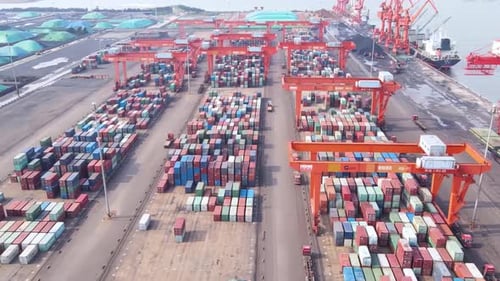 Bird's view container ship carrying container in import export business logistic and transportation.
