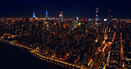 Manhattan panorama with amazing illumination. Night scenery of New York, USA at night.