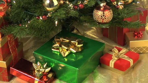 Festive Presents Arranged Under Decorated Christmas Tree