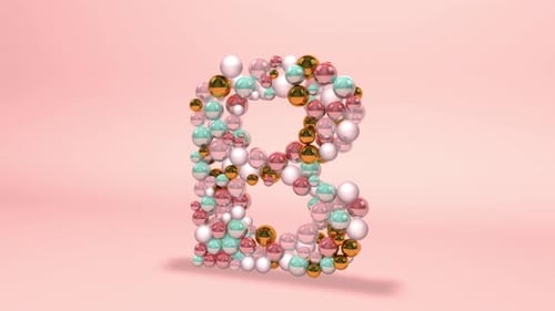 Buchstabe B aus Perlen, Glaskugeln, Pastellperlen, Kristalljuwelen und Gold.