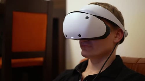 Man Wearing VR Headset Indoors