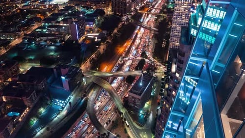 Stunning Aerial Night View Traffic Below Luminous City Skyscrapers