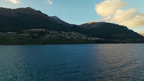 Queenstown overlooks Lake Wakatipu nestled in gentle sloping hillside