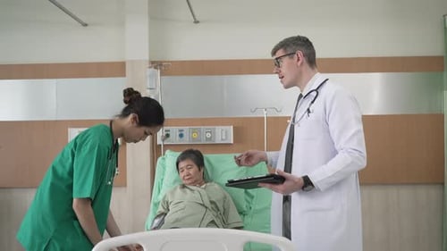 Doctor check up senior patient at hospital.