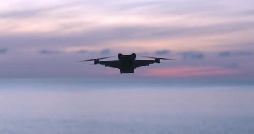 Drone or Copter on Sea Water Background Modern Drone Quad Copter for Shooting Photos and Videos From