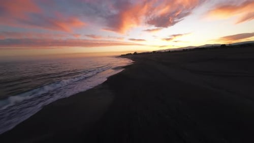 Sea View of a Coast with a Sunrise Sky