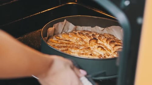 Dessert Baking Inside Brightly Lit Oven Close Up