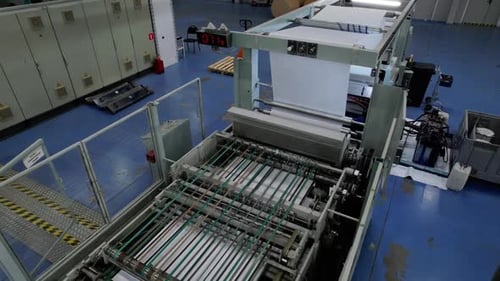 Processing Machine Operates in Cardboard Packaging Workshop Building