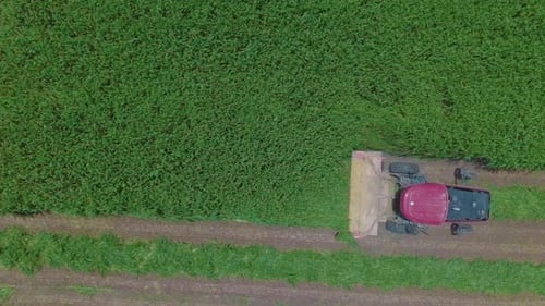 Drone following a tractor across the field