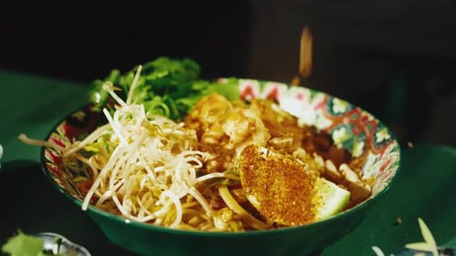Delicious noodle bowl dish with fresh sprouts