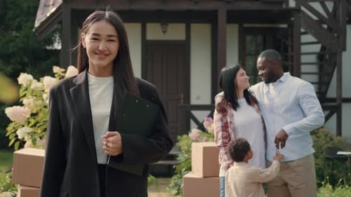Portrait of a Successful Asian Female Real Estate Agent Who Made a Successful Deal