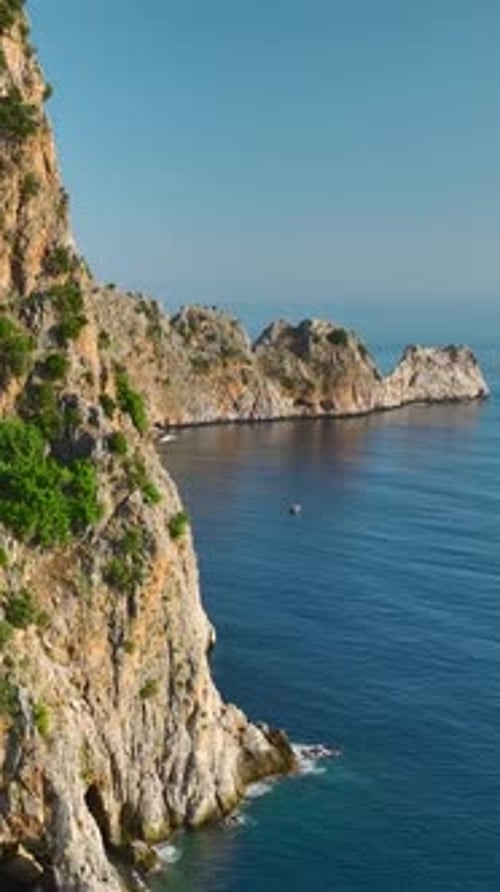 Vertical Video Azure Coastline Aerial Gaze on Yachts Sailing Along Mediterranean Shores