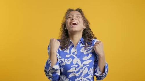 Young Woman Shows Triumph Yes Gesture of Victory Glad Teenager Girl Won Winner