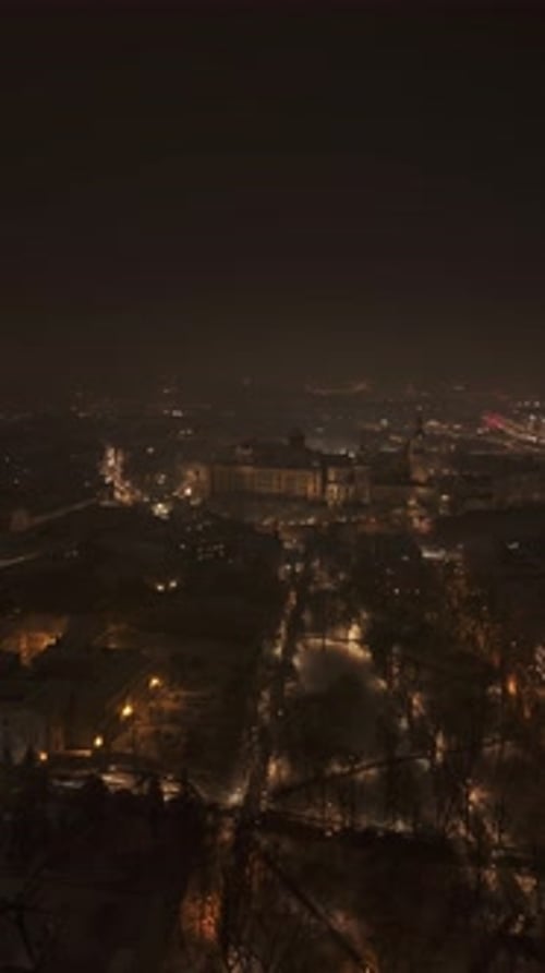 Evening Winter Flight Over Krakow Old Town with View of Wawel