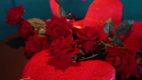 Red Roses on Heart Shaped Gift Box