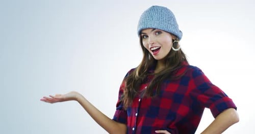 Stylish Young Woman Posing in Studio Setting