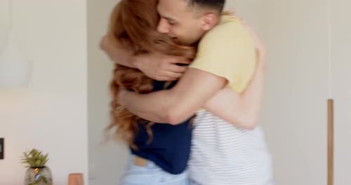 Happy Couple Celebrate Pregnancy News in Bedroom