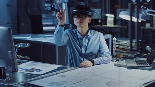 Professional Japanese Development Engineer is Working in a AR Headset, Moving Virtual Pieces Around