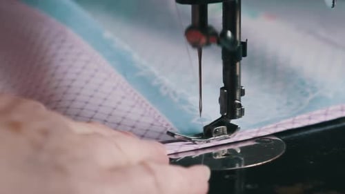 Sewing Machine Stitches Fabric