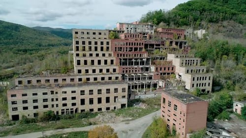 Aerial View of an Abandoned Factory in Natural Landscape Ruined Mountainconcentrating Combine