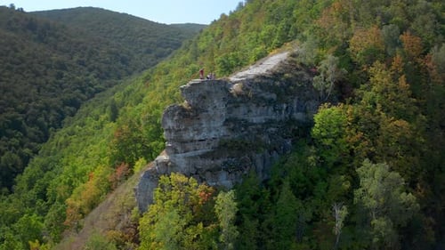 Hikers on the rock. Group of hikers stand on top of the rock ( Camel Rock) and enjoy the view.